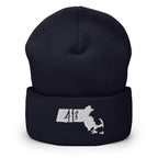 A dark navy blue knit beanie with a folded cuff, featuring a white embroidered graphic of the state of Massachusetts with the number 413 inside.